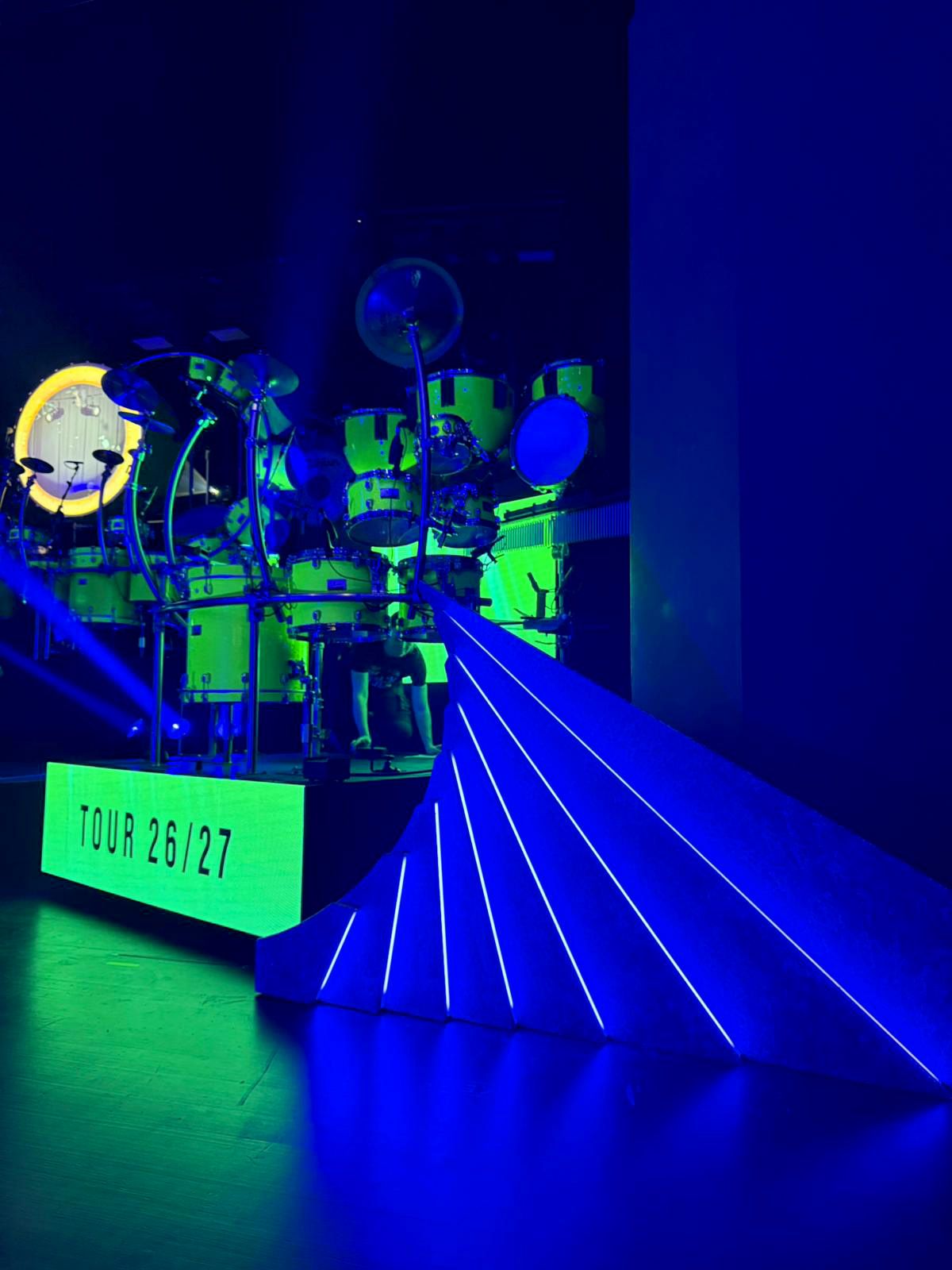 The stage elements blend seamlessly into the overall visual concept