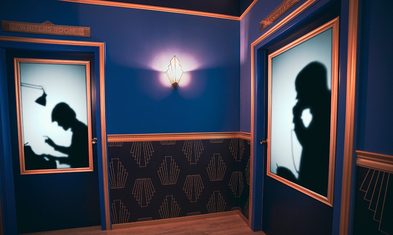 Silhouettes portraying busy film departments